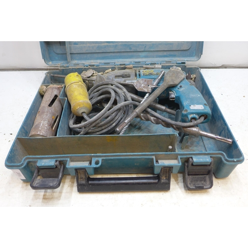 2031 - 3 Makita corded and cordless drills in cases