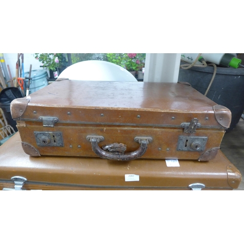 2082 - Two vintage suitcases, quantity of brass items and an Encore left handed acoustic guitar