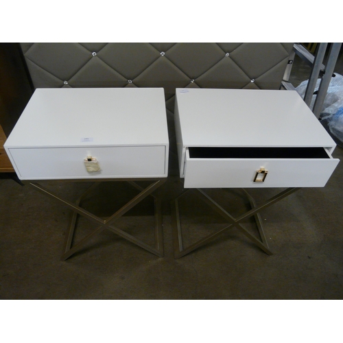 1441 - A pair of white bedside tables with cross legs