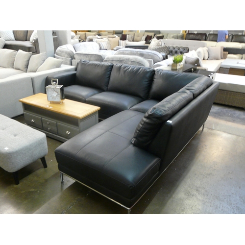 1525 - A black leather corner sofa on semi exposed chrome frame