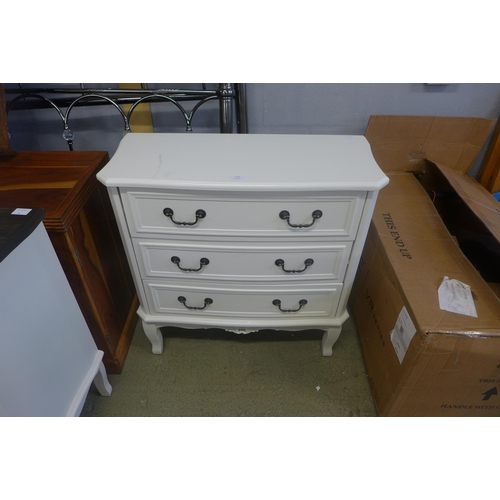 1632 - A three drawer chest with contrast top and a square chrome mirror (damaged)