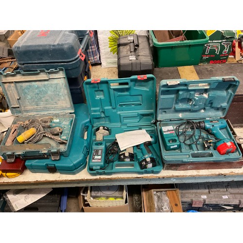 2031 - 3 Makita corded and cordless drills in cases