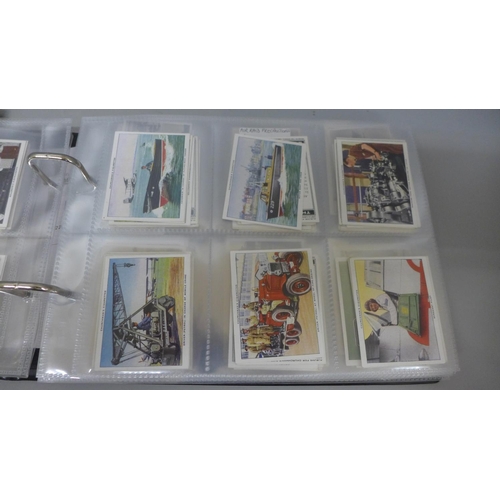 627 - Cigarette cards, album of military related cigarette cards, ten complete sets