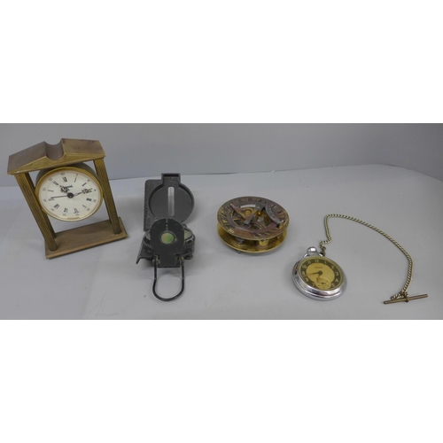 629 - A compass, pocket watch, clock and brass compass with sun dial