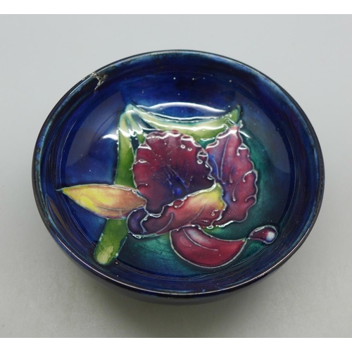 635 - A Moorcroft trinket dish, rim a/f, 8cm