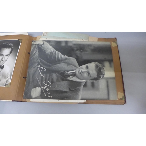 644 - An album of mid-20th Century film star publicity photographs, some with real and facsimile autograph... 