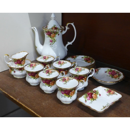 648 - A Royal Albert Old Country Roses coffee set, six setting with cream and sugar and two dishes