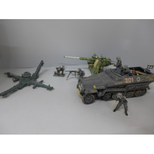 656 - Three boxes of plastic German army soldiers, tank and field gun