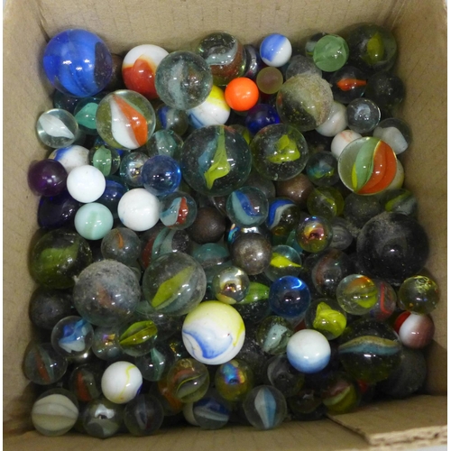 673 - A collection of vintage marbles