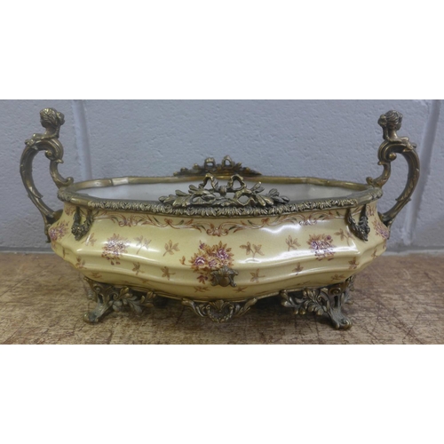 746 - A European brass and ceramic planter with mermaid figureheads, 37cm