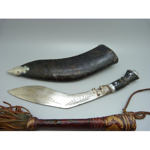 770 - A collection of three pocket knives, a kukri and one other knife