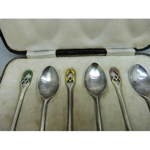 786 - A cased set of six silver and enamelled spoons, Sheffield 1933, 37g