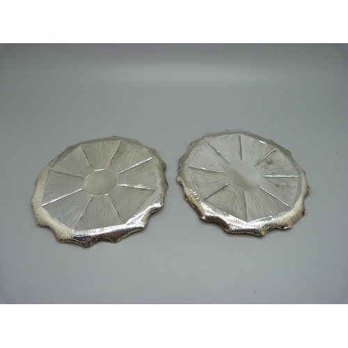 794 - A pair of Arts and Crafts silver pin dishes, London 1901, William Comyns, 95g, 11cm