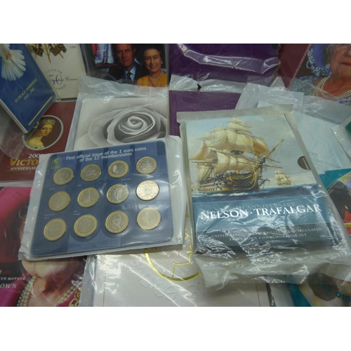 825 - Sixteen Royalty commemorative coin sets, and others