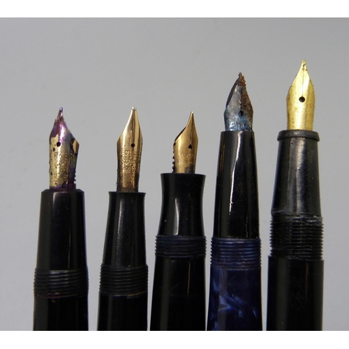 827 - Five ink pens including two with 14ct gold nibs and one with 18ct gold nib, and a silver and mother ... 