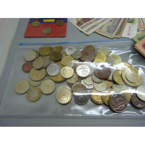 832 - A collection of foreign coins and bank notes