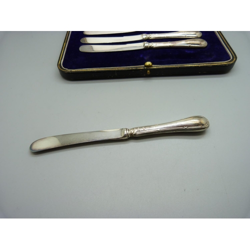 835 - A set of six silver handled butter knives