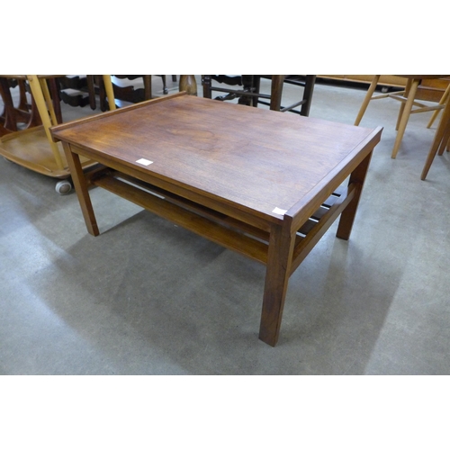 75 - A teak coffee table