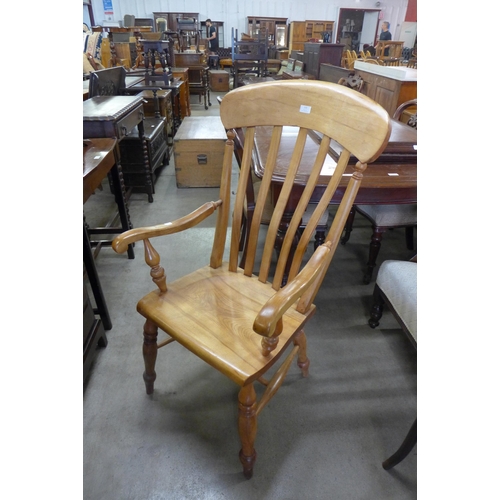 156 - A beech farmhouse armchair