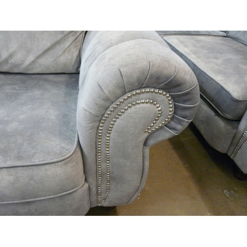 1303 - A Dynasty corner sofa and love seat