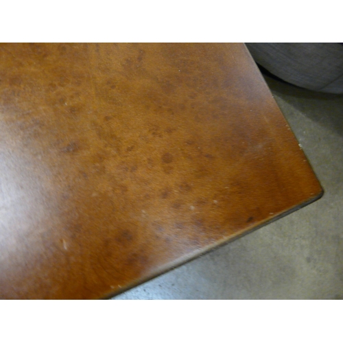 1334 - A walnut effect coffee table