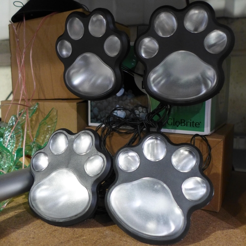 3165 - Paw lights, solar powered insect repeller, two solar Hummingbird wind chimes and a floating fountain