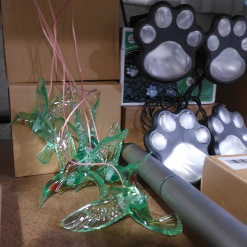 3165 - Paw lights, solar powered insect repeller, two solar Hummingbird wind chimes and a floating fountain