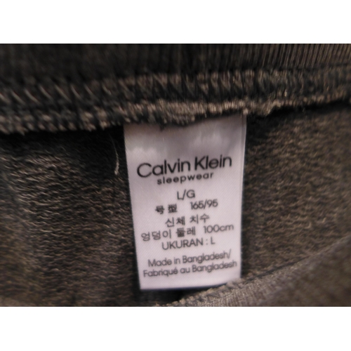 3277 - 4 Pairs of ladies Calvin Klein jogging bottoms (2 x small, 2 x large) - mixed colours * This lot is ... 