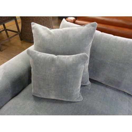 1497 - A steel blue velvet three seater sofa