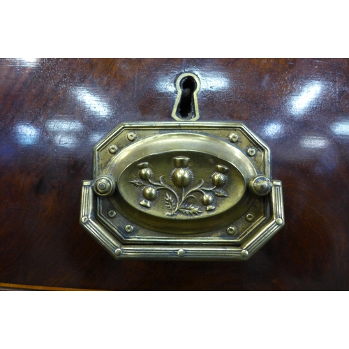 10 - A Regency mahogany and brass inlaid bow front chest of drawers