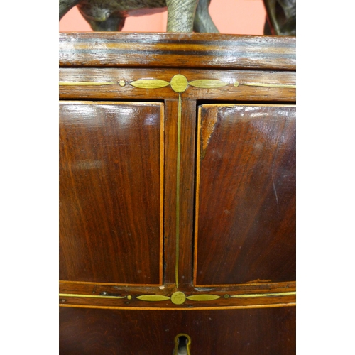 10 - A Regency mahogany and brass inlaid bow front chest of drawers