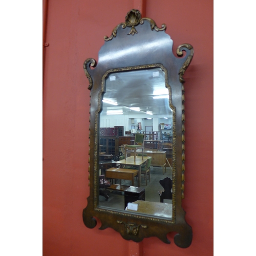 11 - A George I style walnut and parcel gilt framed mirror