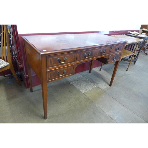 15 - A George III style mahogany inlaid mahogany desk