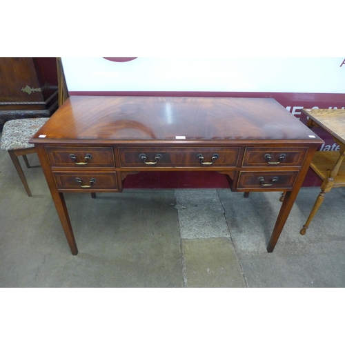 15 - A George III style mahogany inlaid mahogany desk