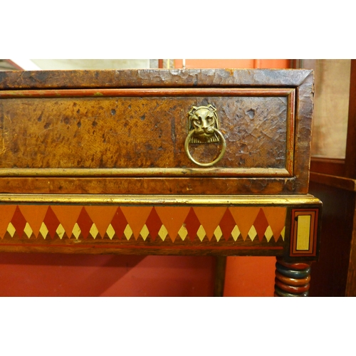 23 - An Art Deco Egyptian Revival walnut and painted leather dressing table, manner of Carlo Bugatti