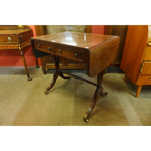 24 - A Regency mahogany drop-leaf sofa table