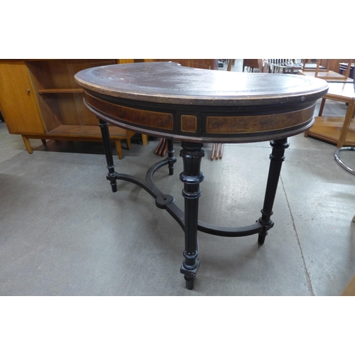 25 - A Victorian Gillows ambonya, ebonised and leather topped kidney shaped writing table