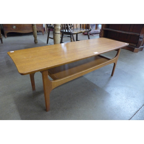 34 - A Jentique teak coffee table