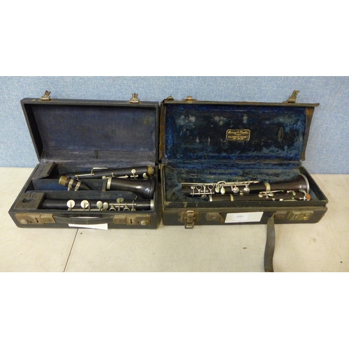 389 - Two clarinets in cases, including one Boosey and Hawkes