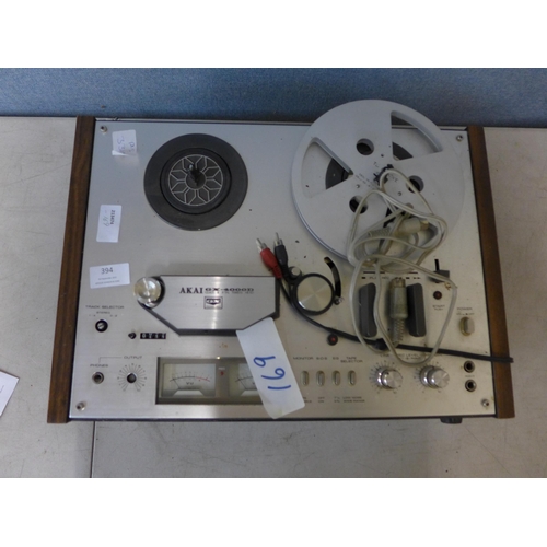 394 - An Akai reel-to-reel tape machine (no lid)