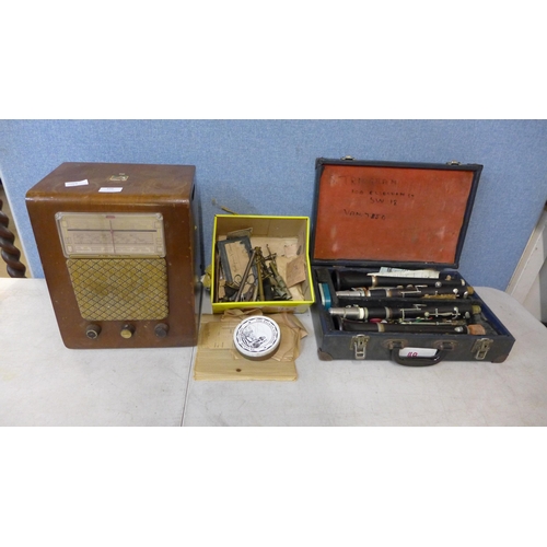 399 - Musical instrument parts/accessories, two clarinets in case and a HMV wireless radio in wooden case