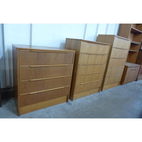 44 - A set of three graduated teak chest of drawers