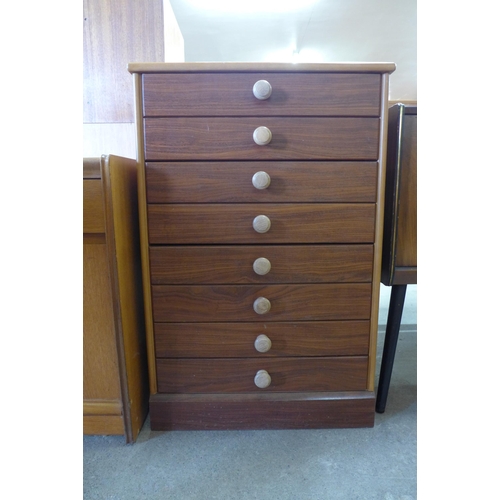 46 - A small teak chest of drawers