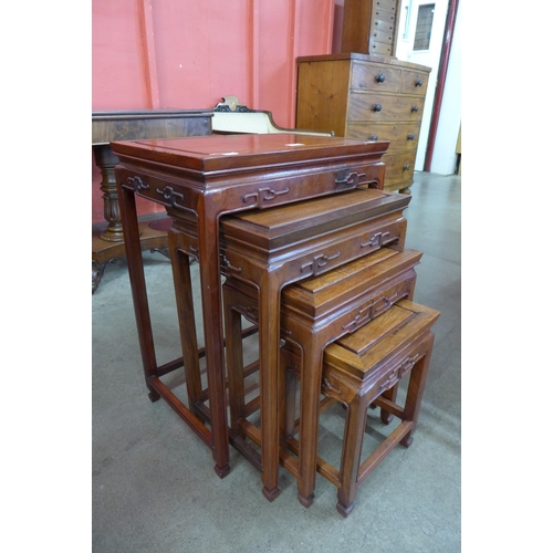 5 - A Chinese hardwood nest of quartetto tables