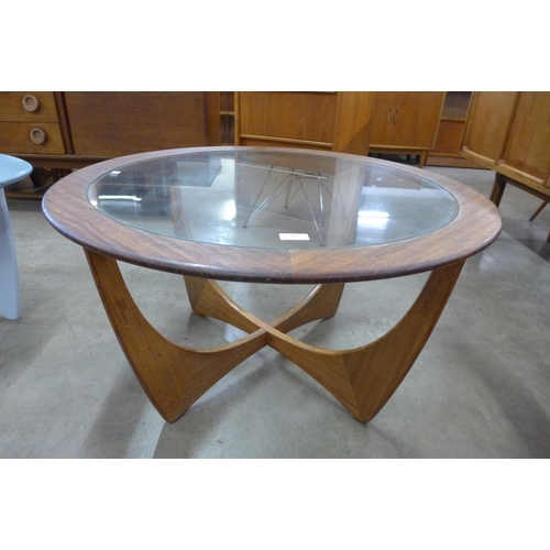 61 - A G-Plan Astro teak and glass topped circular coffee table