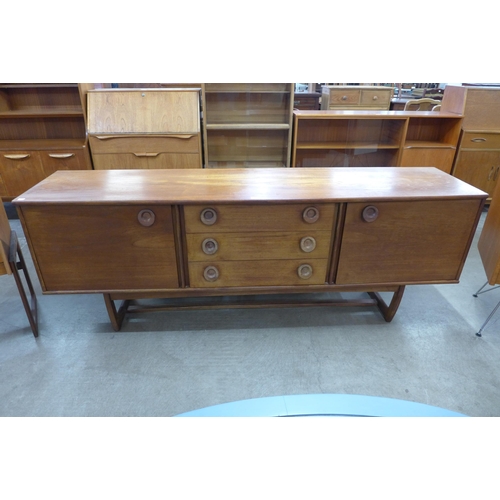 65 - A teak sideboard