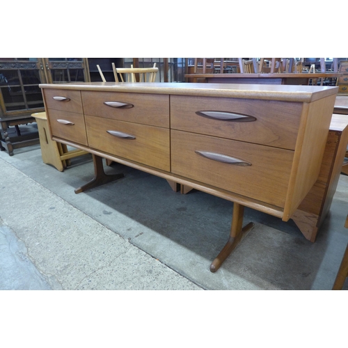 73 - An Austin Suite teak six drawer sideboard