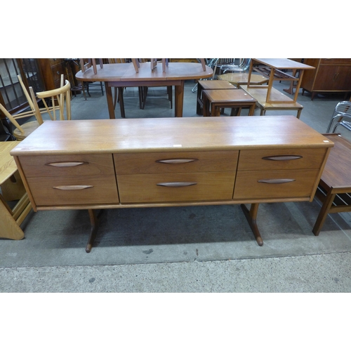 73 - An Austin Suite teak six drawer sideboard