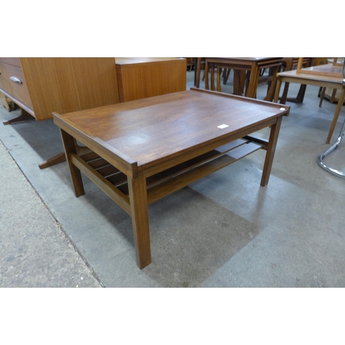 75 - A teak coffee table