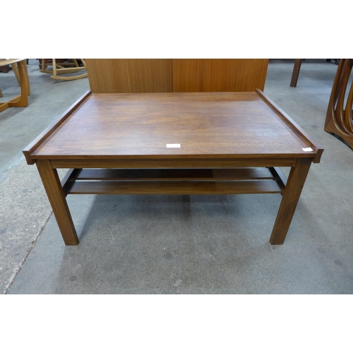 75 - A teak coffee table